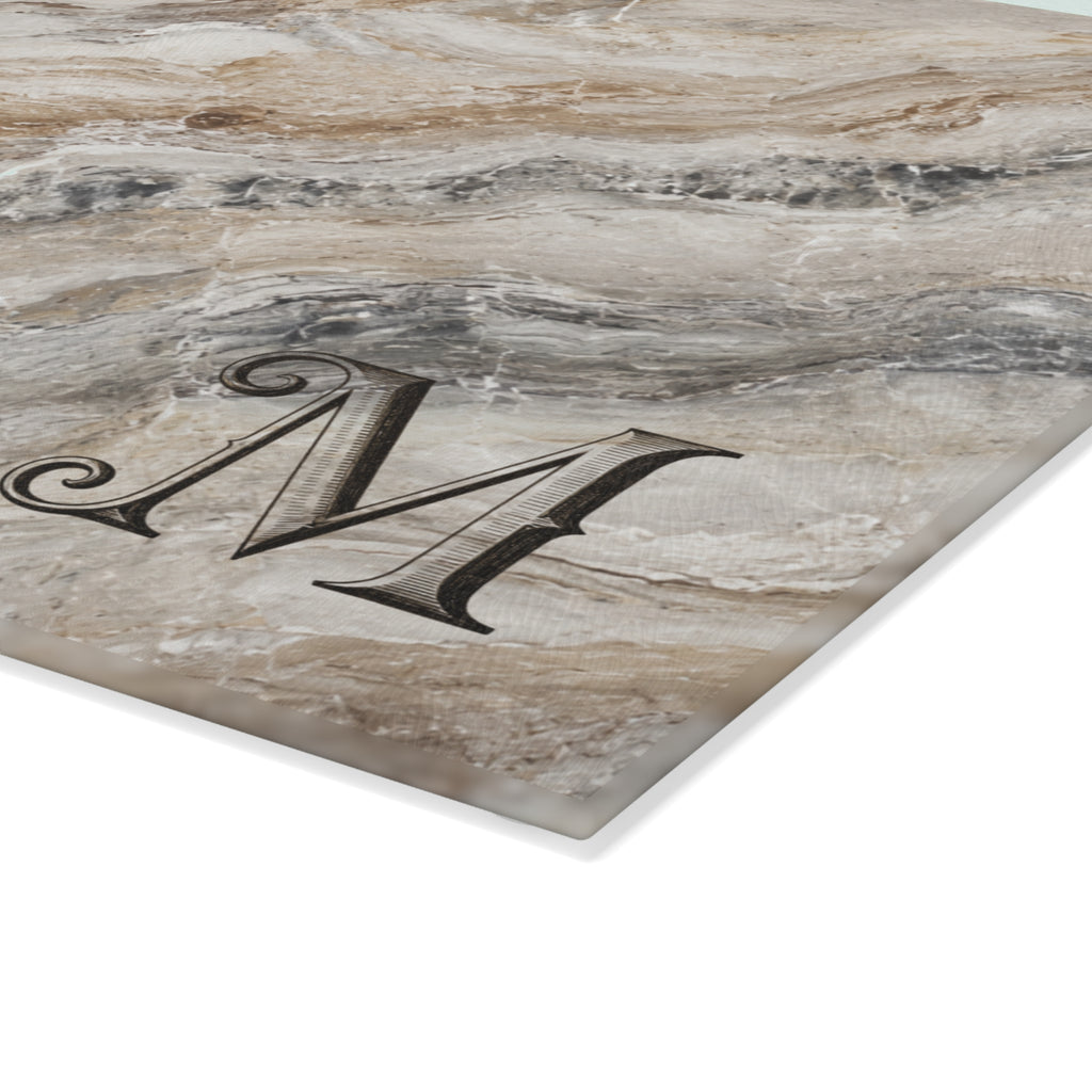 Closeup of monogram letter on marble glass serving board, permanently fired on tempered glass