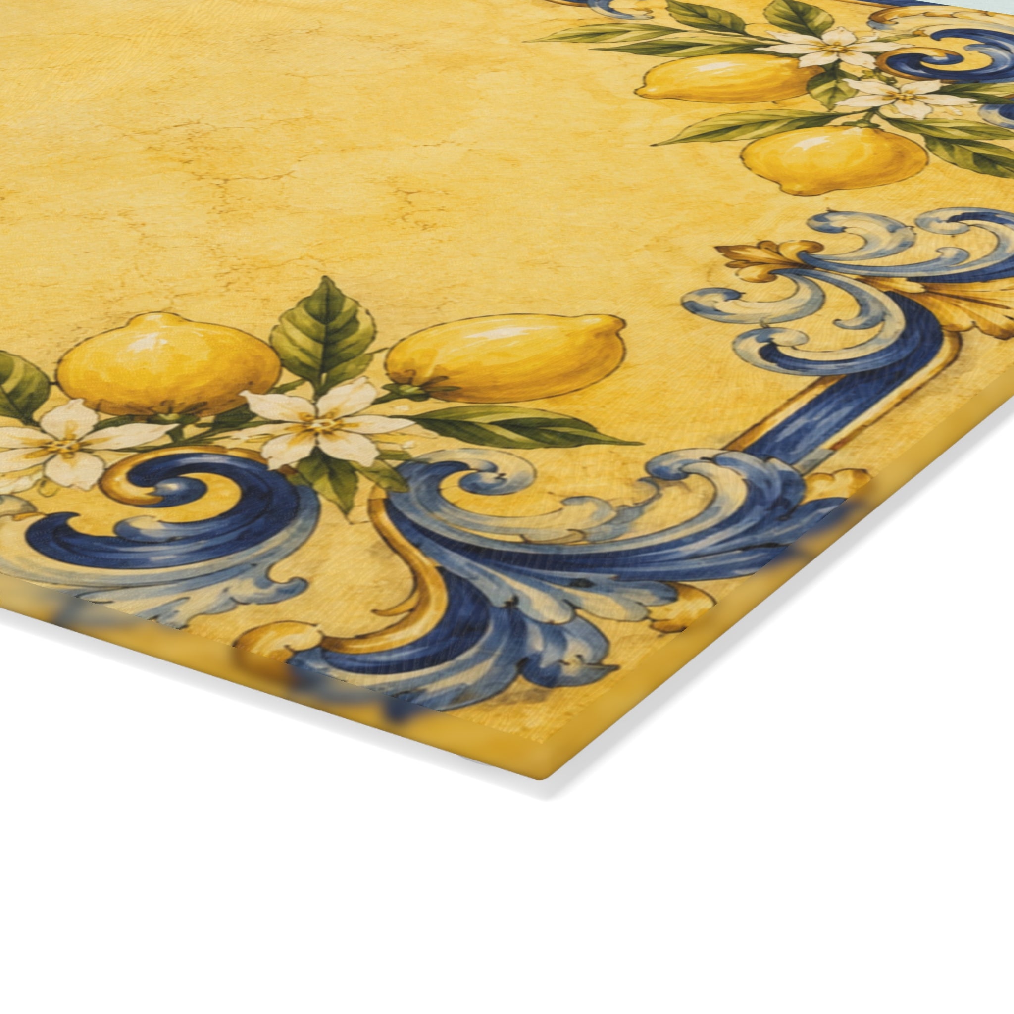 Closeup of cobalt blue baroque scrollwork and Sicilian lemon artwork permanently fired on glass board