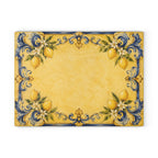 Italian blue and gold glass charcuterie board styled on marble counter with wine and lemons